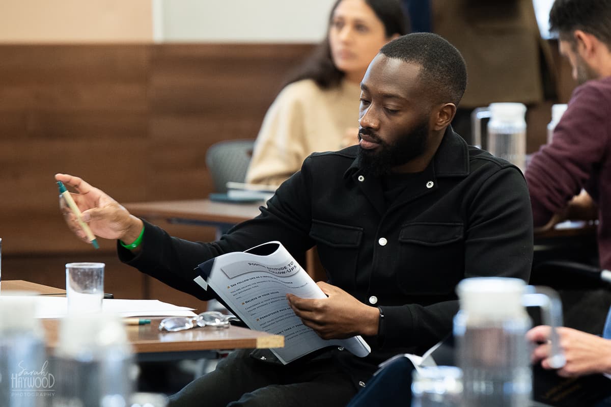 Attendees taking part in a B2B sales training session