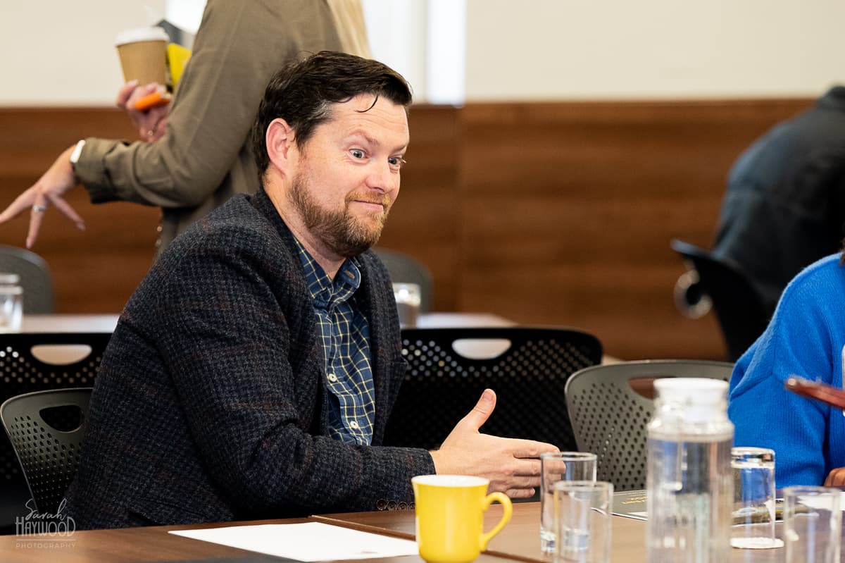 Group coaching and discussion during sales resilience training