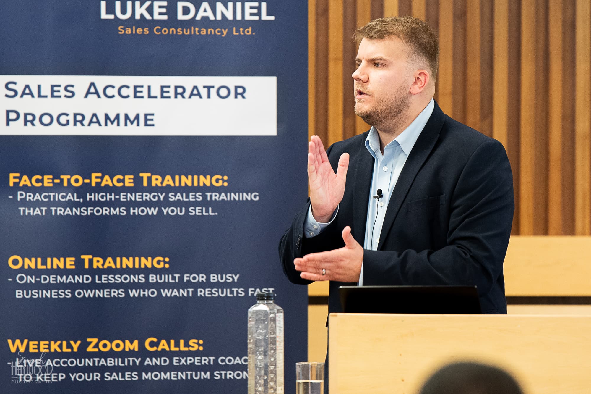 Luke Thompson presenting at sales seminar