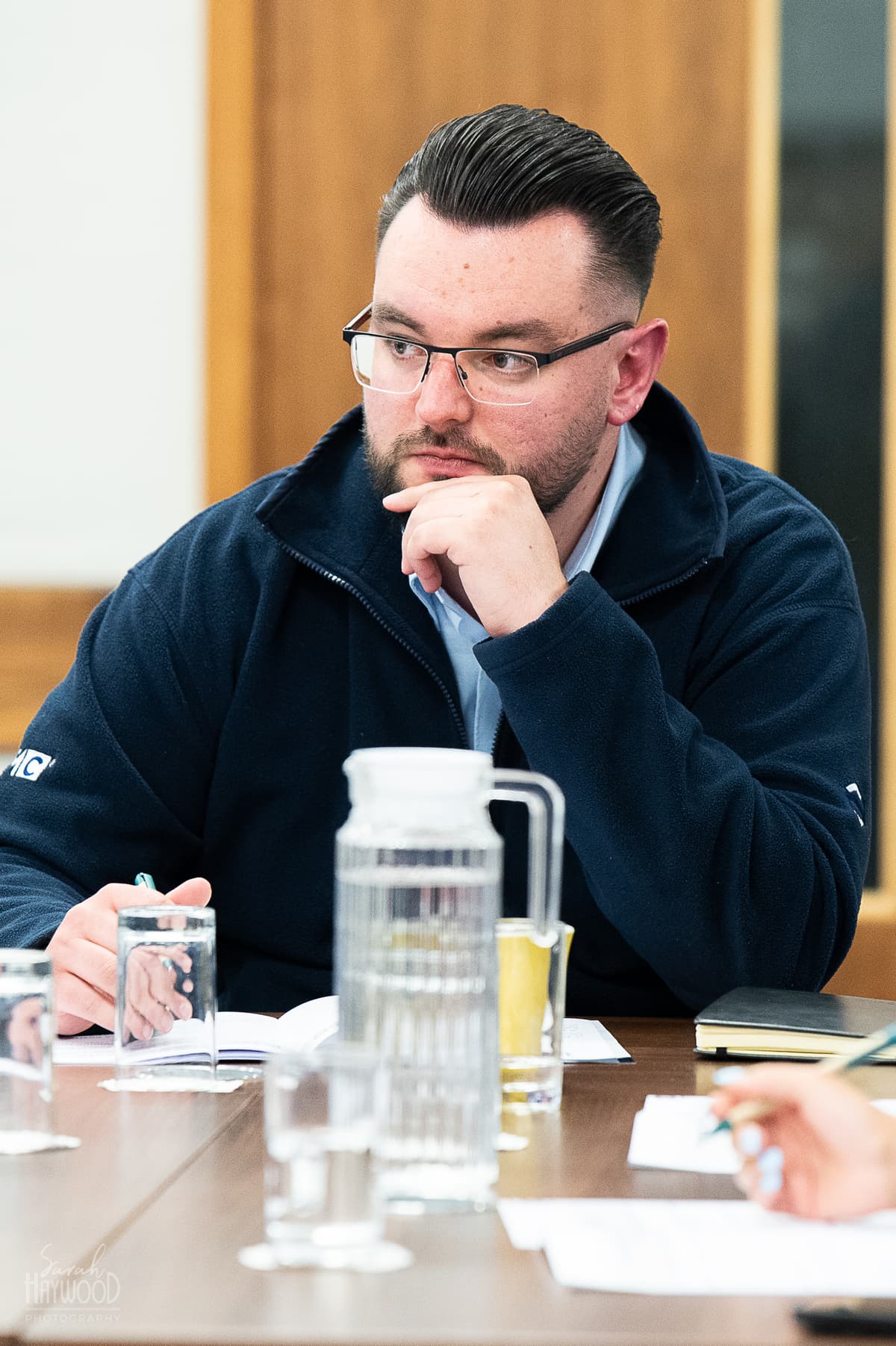 Participants discussing objections during in-person sales training