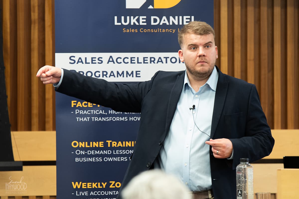 Luke Daniel discussing Sales Control Audit findings with business owners